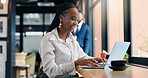 Business, black woman and laptop in cafe for typing, writing corporate proposal and remote work with coffee. Report, feedback or email response for admin, info or out of office research in diner