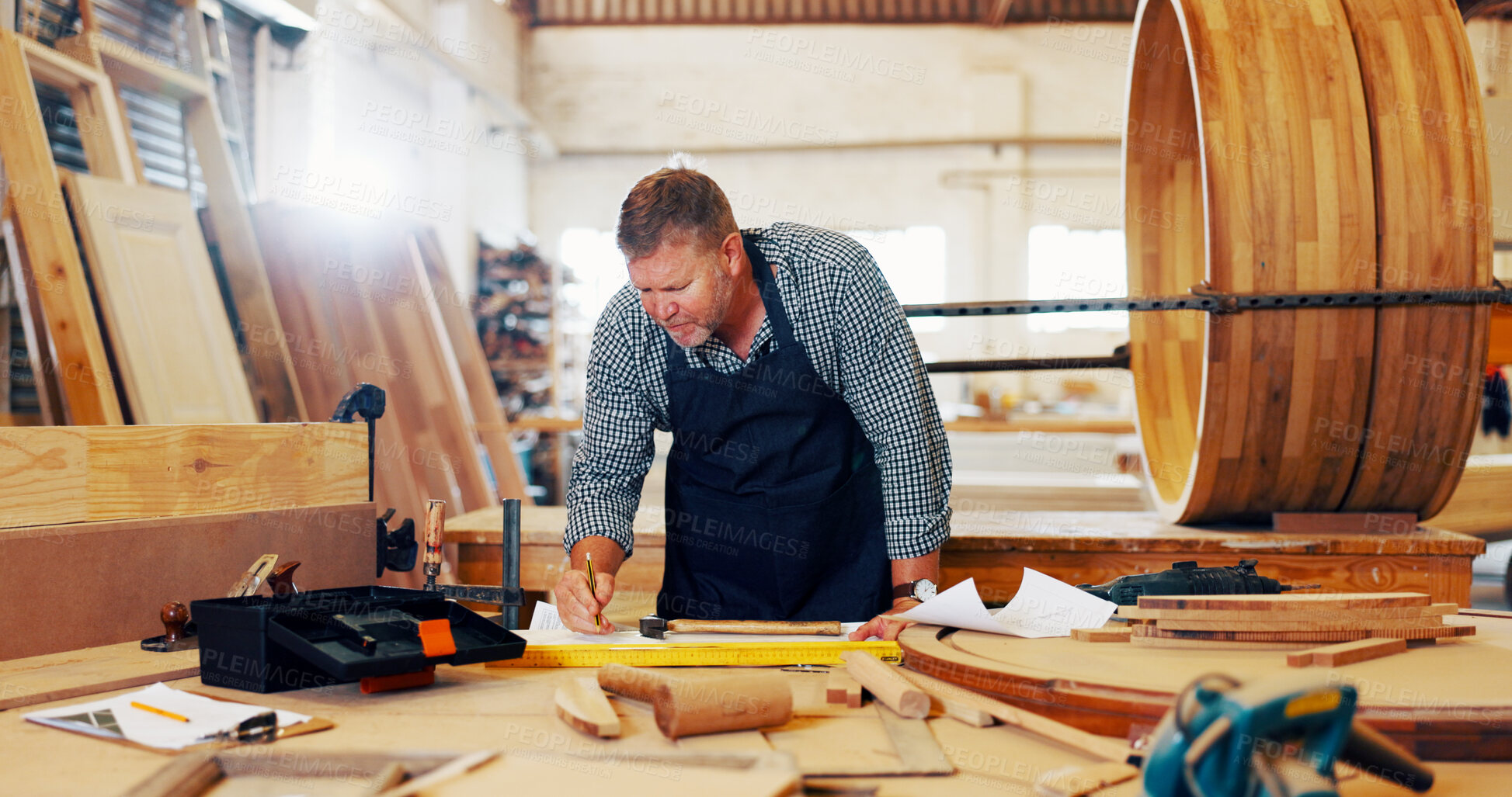 Buy stock photo Carpentry, industry and writing with man in workshop for manufacturing or production process. Creative, design and drawing with carpenter in woodworking studio for craftsmanship or manual labor