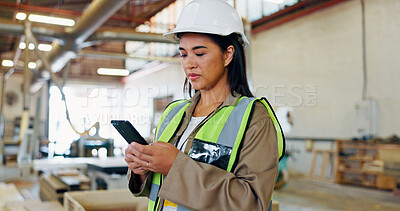 Buy stock photo Phone, woman and engineer in warehouse for stock, storage or text for furniture production. Technology, worker and carpenter in factory for manufacturing, woodwork and check inventory in industry
