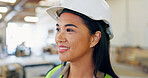 Ideas, woman and engineer in workshop for project, planning or maintenance in building. Decision, brainstorming and Asian female construction worker on site for repairs at industry warehouse.