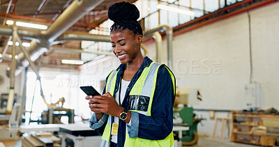 Buy stock photo Phone, woman and happy engineer in factory for inventory, storage or text for furniture production. African worker, technology and carpenter in warehouse for manufacturing, woodwork and check stock