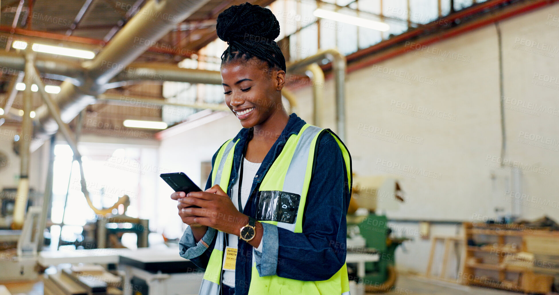 Buy stock photo Phone, woman and happy engineer in factory for inventory, storage or text for furniture production. African worker, technology and carpenter in warehouse for manufacturing, woodwork and check stock