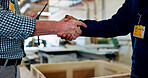 Men, engineer and handshake for carpentry at warehouse for partnership, agreement and construction deal. People, shaking hands and welcome of b2b, manufacturing negotiation and onboarding opportunity