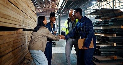 Buy stock photo Group, people and handshake for carpentry at warehouse for partnership, agreement and construction deal. Team, shaking hands and welcome for b2b, manufacturing negotiation and onboarding opportunity