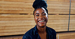 Black woman, portrait and happy with wood at warehouse, pride and ready for career at lumber plant. Person, smile and job with timber production, manufacturing and industry at factory in Nigeria
