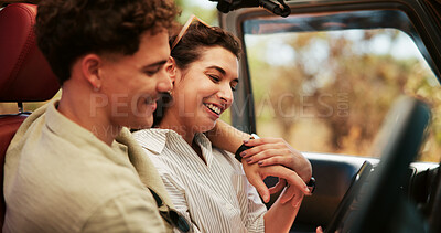 Buy stock photo Smile, couple and phone in car for road trip for travel, navigation and journey for vacation. People, embrace and mobile for social media, summer holiday, adventure route and bonding on romantic date