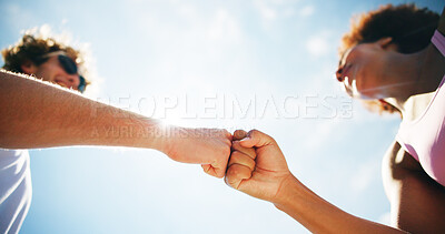 Buy stock photo Woman, man and fist bump for fitness, outdoor and low angle with achievement, goals and training with sky. People, team and support with workout for marathon, respect and motivation for exercise