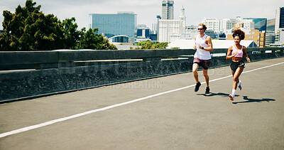 Buy stock photo Woman, man and running for fitness, bridge and endurance in summer for wellness, challenge or exercise. People, team and together for cardio, workout and outdoor with training for marathon in city