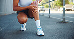 Person, knee pain or exercise injury in city, muscle cramps or tension with fitness mistake. Fibromyalgia, discomfort and female athlete hands with tendon tear, sport fracture or inflammation outdoor