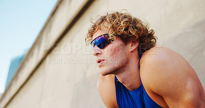 Buy stock photo Thinking, breathing and runner or man with glasses in city for workout, marathon training and resting. Reflection, exercise and wellness with male person downtown for cardio, athlete and health