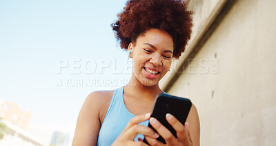 Buy stock photo Fitness, music or happy woman in city laughing for running, outdoor workout or training. Playlist, earphones or African runner with low angle for sports routine, exercise video or funny meme joke