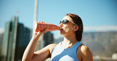 Buy stock photo Fitness, woman and drinking water in city on break with fatigue, relax or exercise recovery. Workout, hydration bottle and thirsty athlete outdoor for wellness, body health or electrolytes for diet