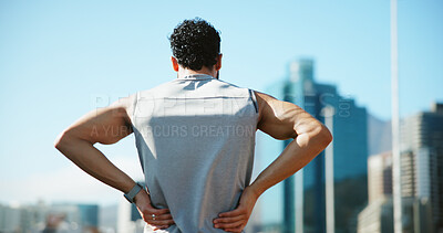 Buy stock photo Back, tired and man outdoor for fitness with fatigue, exhausted and relax for exercise recovery. Workout, rest and athlete in city for wellness, body health and break for training challenge with view