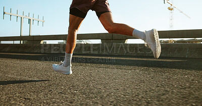Buy stock photo Health, fitness and legs of person running on bridge in city for race, marathon or training. Sports, outdoor and feet of athlete on highway with cardio workout, challenge or exercise in town.
