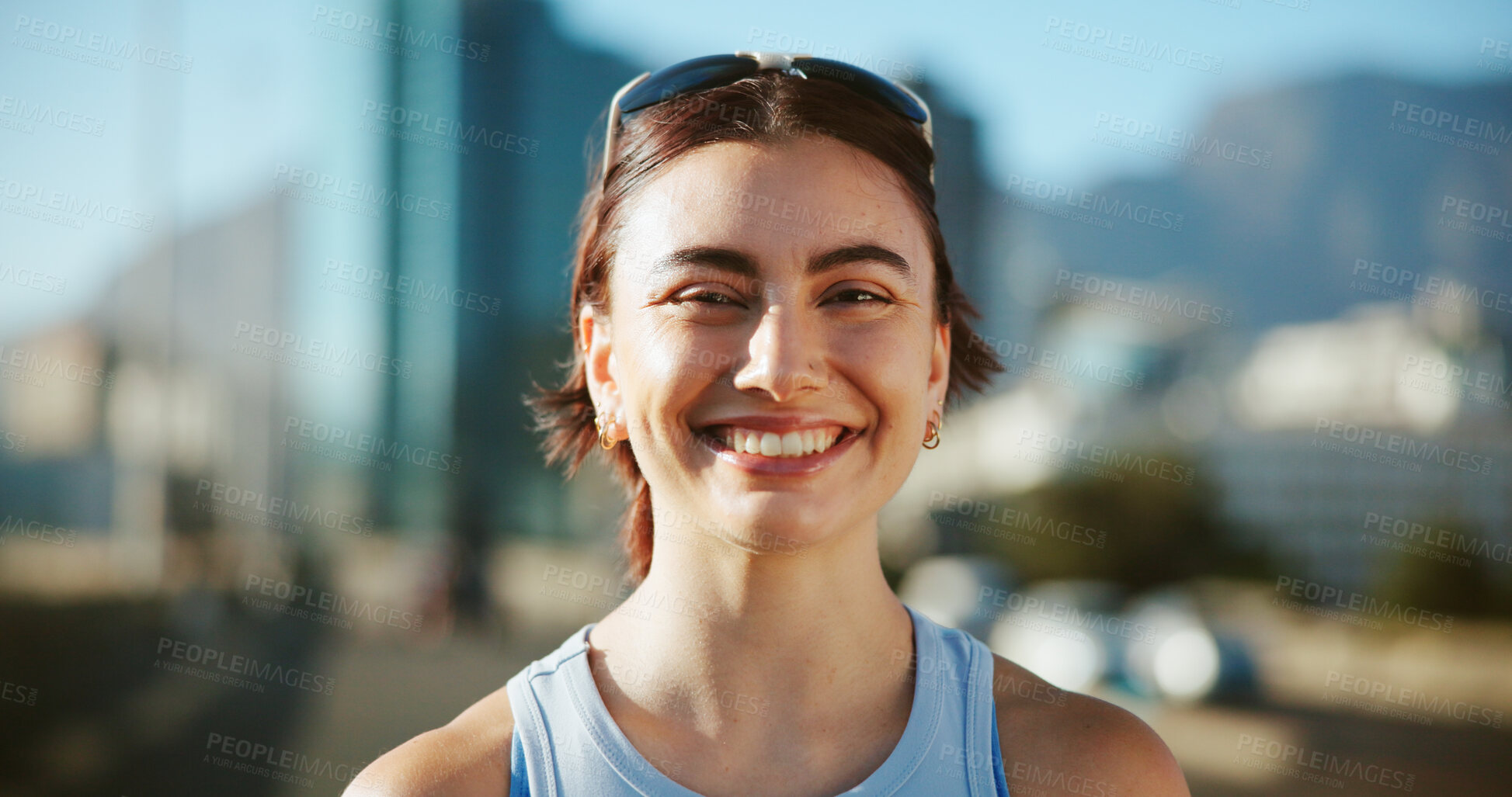 Buy stock photo Fitness, woman and portrait in city with smile, confidence and ready with wellness routine. Face, athlete and happy in urban Spain for cardio challenge, personal trainer and exercise break for health