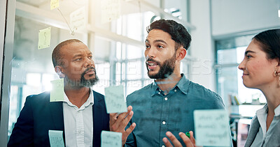 Buy stock photo Discussion, ideas and business people at glass with collaboration, sticky note and brainstorming in office. Strategy, problem solving and planning with moodboard for growth, development and teamwork