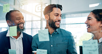 Buy stock photo Teamwork, ideas and happy business people at glass with collaboration, sticky note or brainstorming in office. Strategy, problem solving or planning at moodboard for growth, development or discussion