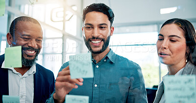 Buy stock photo Collaboration, ideas and happy business people at glass with teamwork, sticky note or brainstorming in office. Strategy, problem solving or planning at moodboard for growth, development or discussion