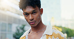 Portrait, serious and man for fashion in city with confidence, streetwear and edgy of trendy style. Male person, pride and gen z in town of urban culture, unique clothes and cool swag on school break
