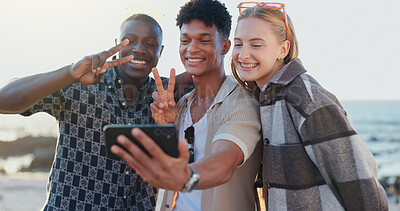 Buy stock photo Friends, people and selfie with peace sign at beach for social media post, travel memory or profile picture update. Happy, group and photography on holiday adventure with bonding, support or vacation