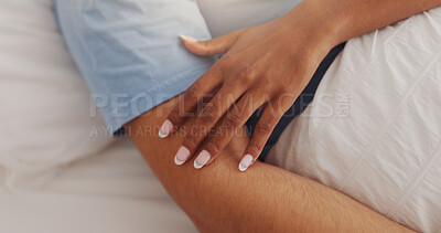 Buy stock photo Hands, touch and couple rest on bed for intimacy, partner affection and connection in morning. Closeup, people and sleeping with embrace for care, romance and bonding for marriage commitment at house