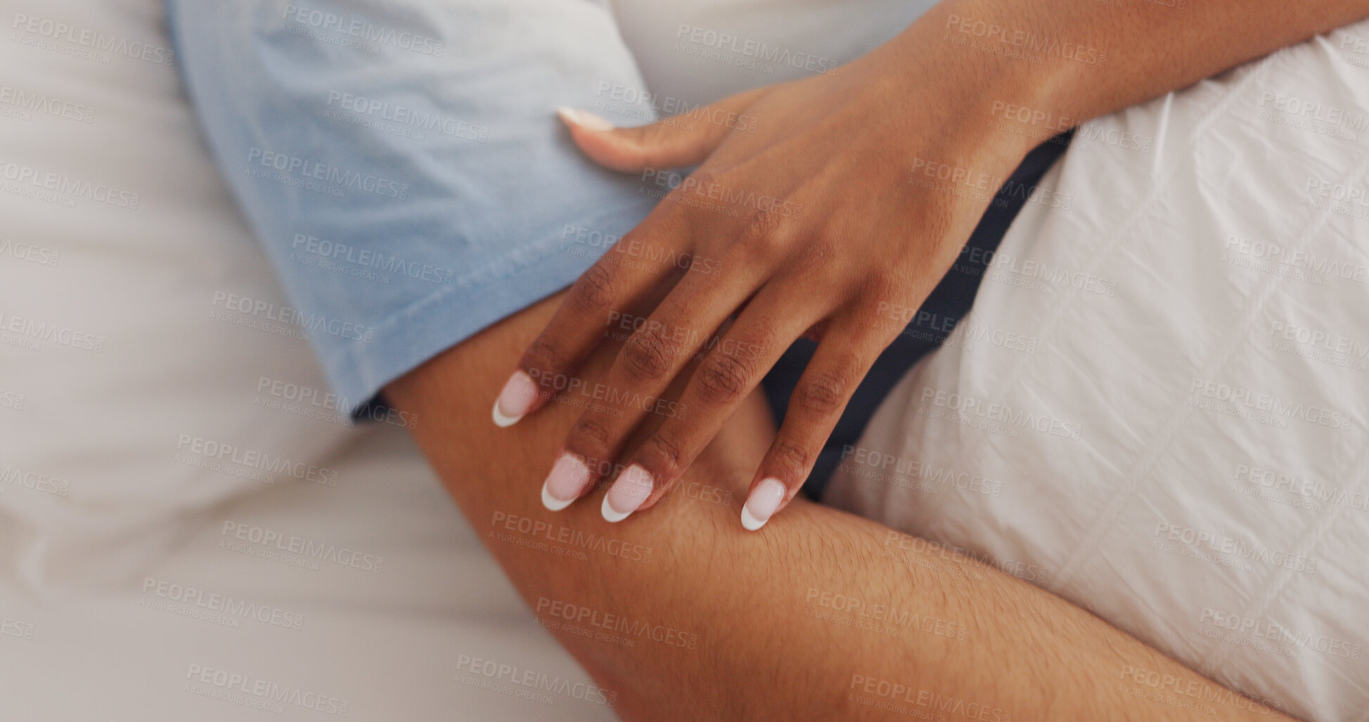 Buy stock photo Hands, touch and couple rest on bed for intimacy, partner affection and connection in morning. Closeup, people and sleeping with embrace for care, romance and bonding for marriage commitment at house