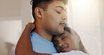 Hug, love and romance with couple in home together for morning affection, bonding or wake up. Safety, trust or weekend with man and woman embracing in apartment for commitment, marriage or security
