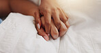 Holding hands, love and couple nap on bed for intimacy, partner affection and connection. Closeup, people and sleeping with cuddle for comfort, romance and bonding for marriage commitment at house