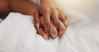 Buy stock photo Holding hands, love and couple closeup on bed for intimacy, partner affection and connection. Nap, people and sleeping with cuddle for comfort, romance and bonding for marriage commitment at house