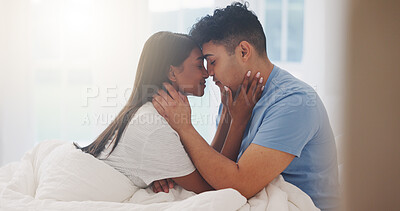 Buy stock photo Couple, forehead touch and love in bedroom together, affection and bonding with commitment for trust at home. Romance, partner and security in healthy relationship, calm and interracial people in bed