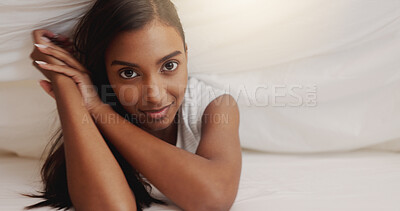 Buy stock photo Blanket, happy and portrait of woman in bed for morning or weekend break and relaxing. Duvet, hospitality and vacation with Indian person under covers in hotel or lodge for accommodation or holiday