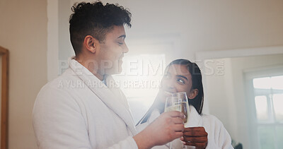 Buy stock photo Couple, champagne and toast with happiness for anniversary, honeymoon or holiday accommodation. Love, bonding and commitment with drinks for cheers, interracial people and vacation getaway in hotel