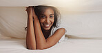 Blanket, portrait and smile of woman in bed for morning or weekend break and relaxing. Happy, hospitality and vacation with Indian person under covers in hotel or lodge for accommodation or holiday