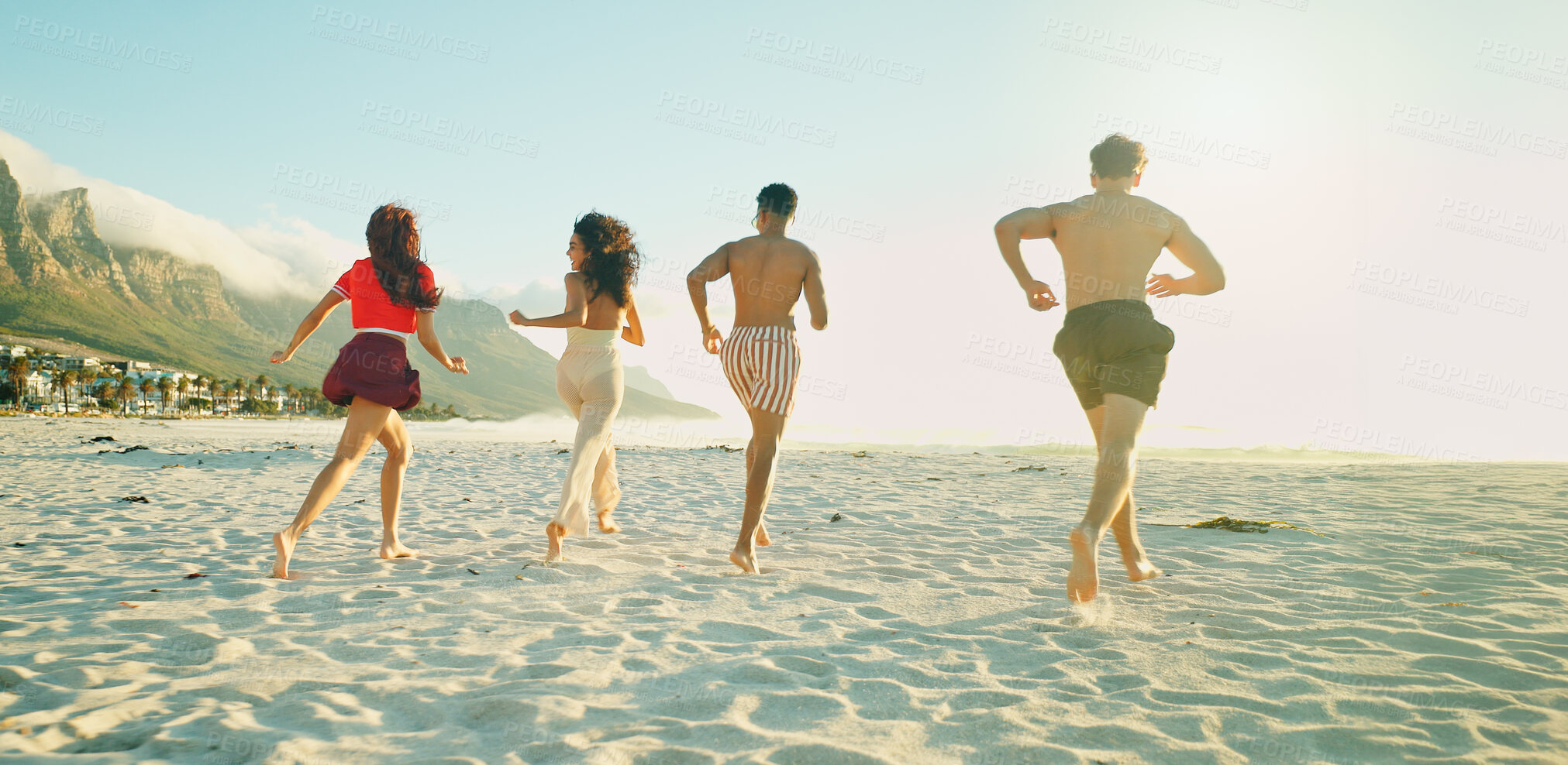 Buy stock photo Running, adventure and back of people by beach on tropical vacation, holiday or getaway together. Fun, travel and group of friends by ocean with activity, journey or freedom on seaside weekend trip.