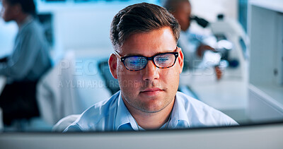 Buy stock photo Computer, healthcare and man with glasses in lab for online research, analysis and medical report. Reading, administration and person on pc for planning experiment, pharmaceutical study and results