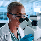 Laboratory, woman and scientist with microscope for research, medical ...