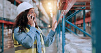 Woman, phone call and talk at warehouse for logistics with deal for order, networking or job at distribution center. Person, smartphone and discussion by shelf, shipping or contact at storage plant