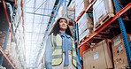Woman, smile and logistics by shelf at warehouse with thinking, perspective and low angle for supply chain. Person, inventory and happy with storage, shipping and job with boxes at industrial plant