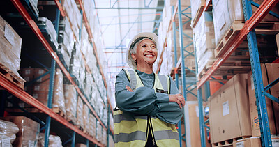 Buy stock photo Warehouse, confidence and woman in logistics inventory with boxes, arms crossed and stock management. Low angle, smile and mature worker in cargo storage, global export and supply chain distribution