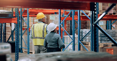 Buy stock photo Distribution, man and woman walking in warehouse for logistics, stock inventory or inspection by shelves. Industrial employees, wholesale and back of people for shipping cargo, storage or factory