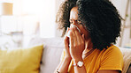 Home, woman and sick with toilet paper for blowing nose, allergy and inflammation of sinus in living room. House, female person and medical virus with tissue for influenza, cold and illness on sofa