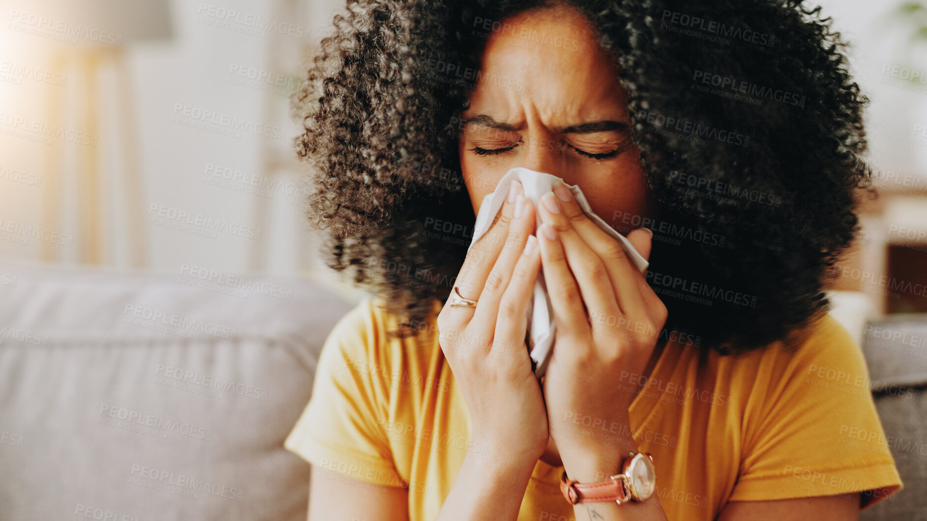 Buy stock photo Sofa, woman and sick with tissue for blowing nose, allergy and inflammation of sinus in living room. Home, female person and medical virus with sneezing for influenza, cold and illness on couch