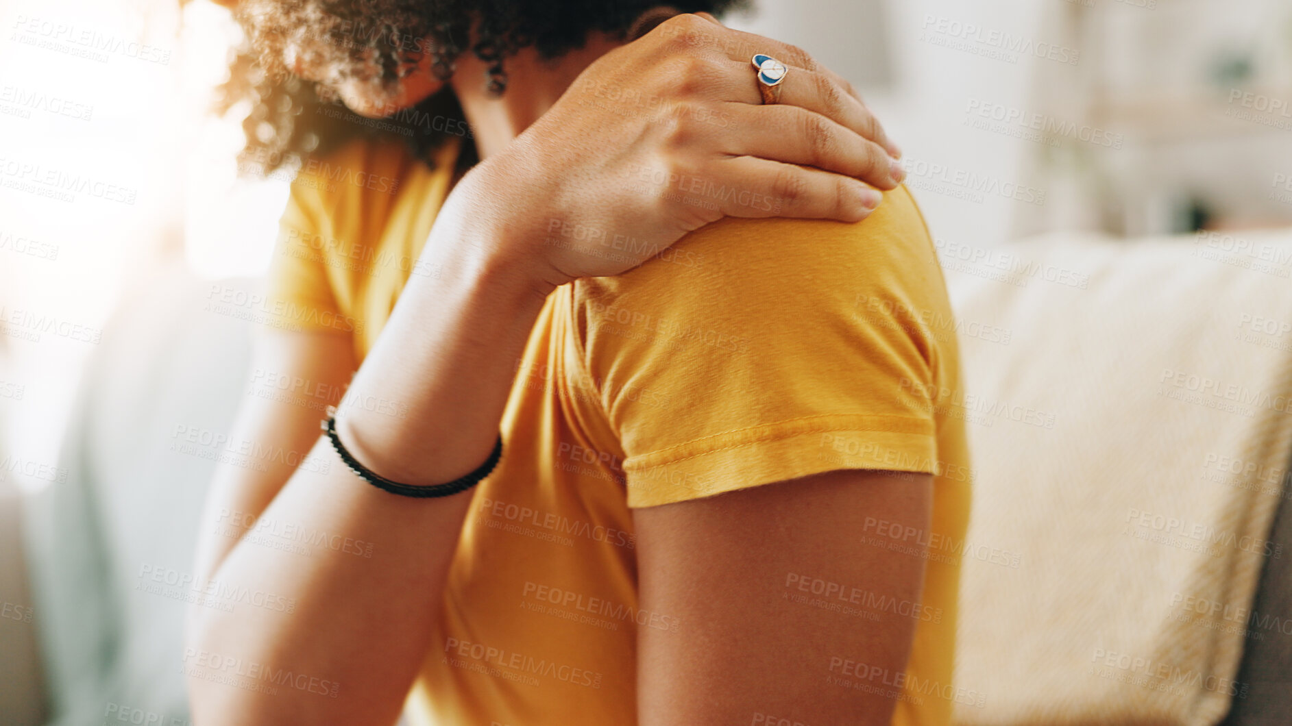 Buy stock photo Woman, hand and shoulder pain with injury on sofa for discomfort, muscle tension or strain at home. Closeup, female person or ache with sore arm for pressure, bad posture or bruise on couch at house