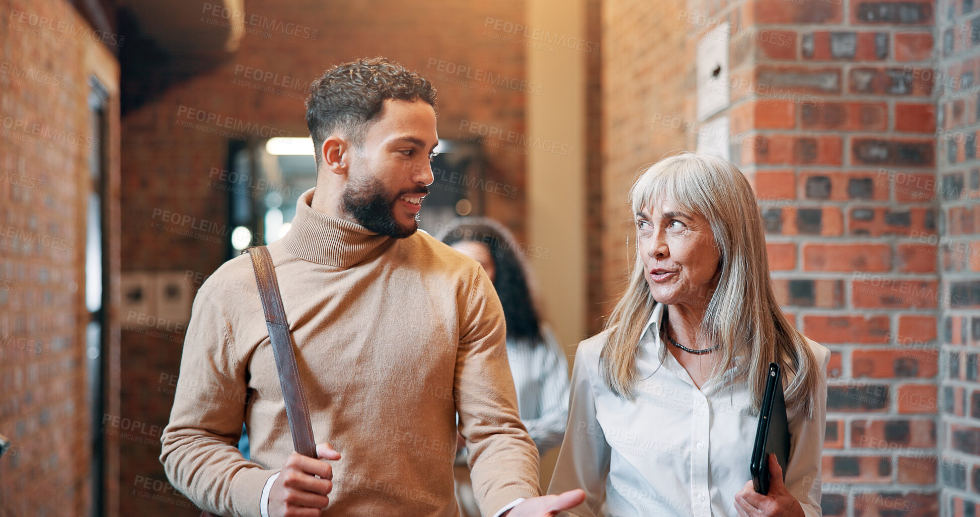 Buy stock photo Walking, talk and teamwork with business people in office for partnership, discussion and support. Advice, communication and feedback with employees in agency for coworking and commitment together