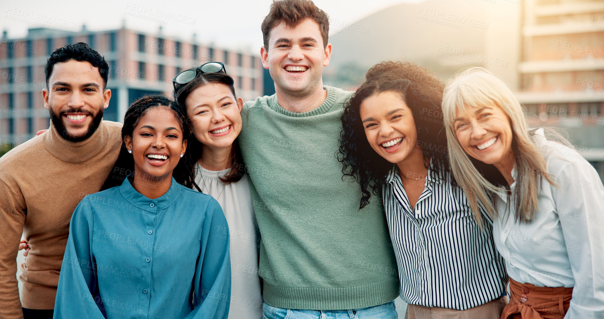 Buy stock photo Hug, portrait and rooftop with business people in city together for collaboration, unity or solidarity. Creative, friends and smile of employee group embracing outdoor in urban town for design career