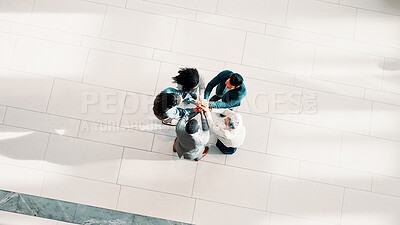 Buy stock photo Above, hands together and business people in office, celebration and commitment. Group, consulting agency and employees in workplace, achievement and success with cooperation, top view and b2b deal