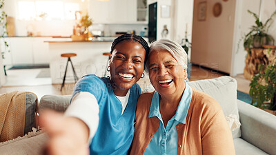 Buy stock photo Medical, selfie and smile of nurse with old woman on sofa in living room of retirement home. Bonding, memories or photograph POV with happy caregiver and senior patient in apartment for healthcare