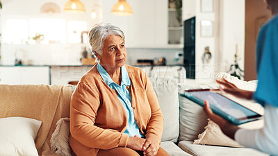 Buy stock photo Tablet, discussion and senior woman with nurse for medical consultation on sofa in home. Technology, conversation and caregiver explain with elderly patient, diagnosis and assisted living at house