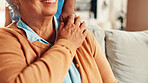 Holding hands, support and nurse with old woman on sofa for healthcare advice, kindness or trust. Medical caregiver, retirement and closeup of senior patient in nursing home for help and elderly care