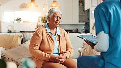 Buy stock photo Tablet, discussion and mature woman with caregiver for medical consultation on sofa in home. Technology, conversation and nurse explain with elderly patient, diagnosis and assisted living at house